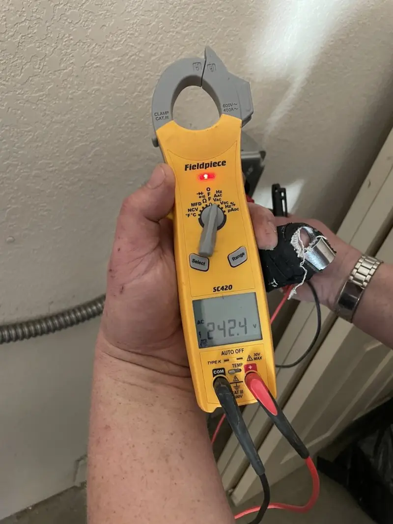 Voltage testing with clamp meter during Generator Installation in Llano